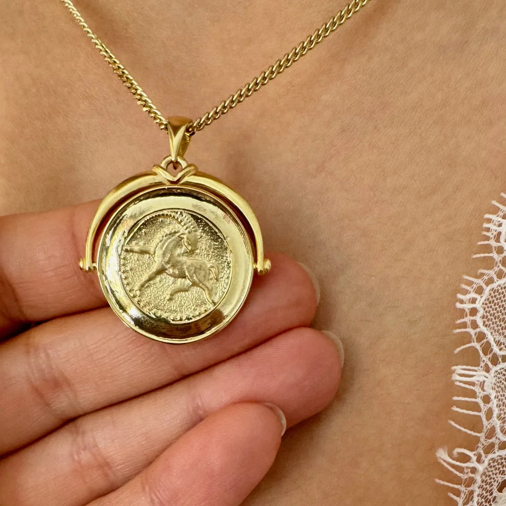 Gold unicorn pendant necklace, perfect for women seeking a unique, vintage style for special occasions.