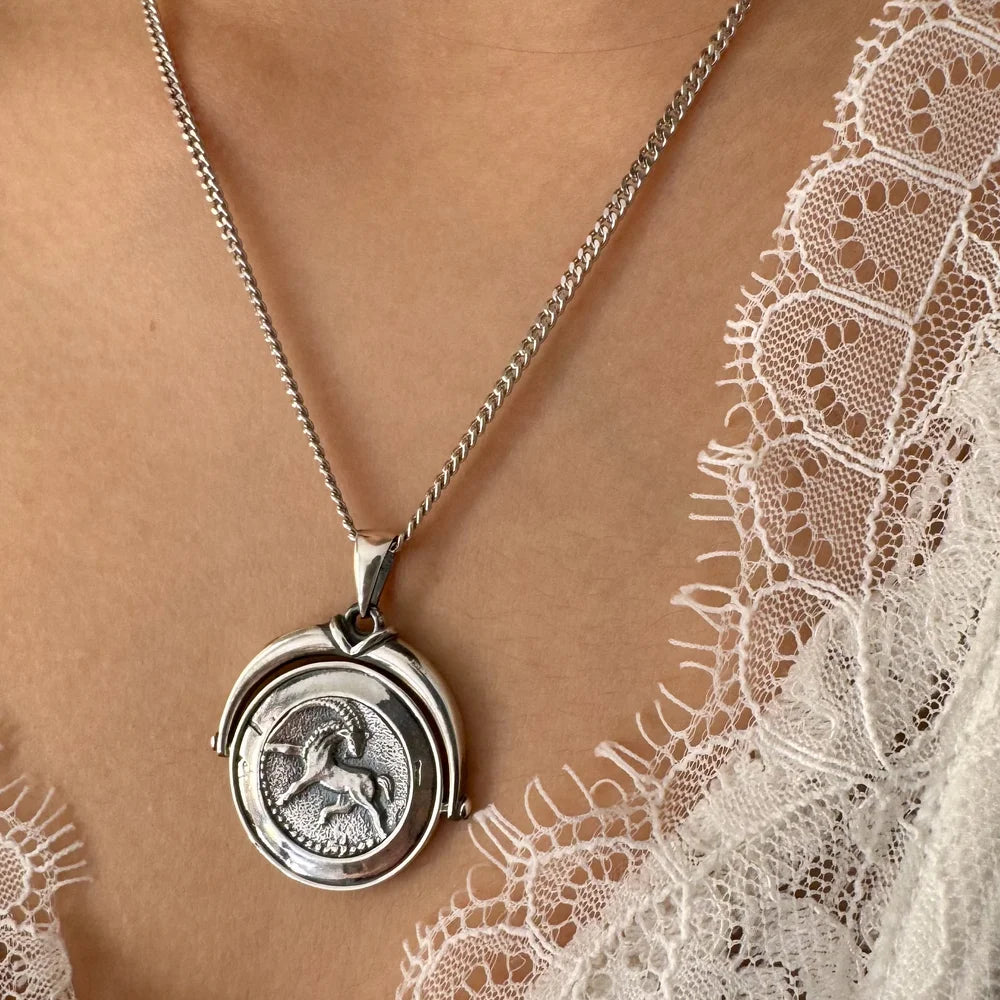Sterling silver unicorn pendant necklace, perfect for women seeking a vintage, whimsical touch for any occasion.