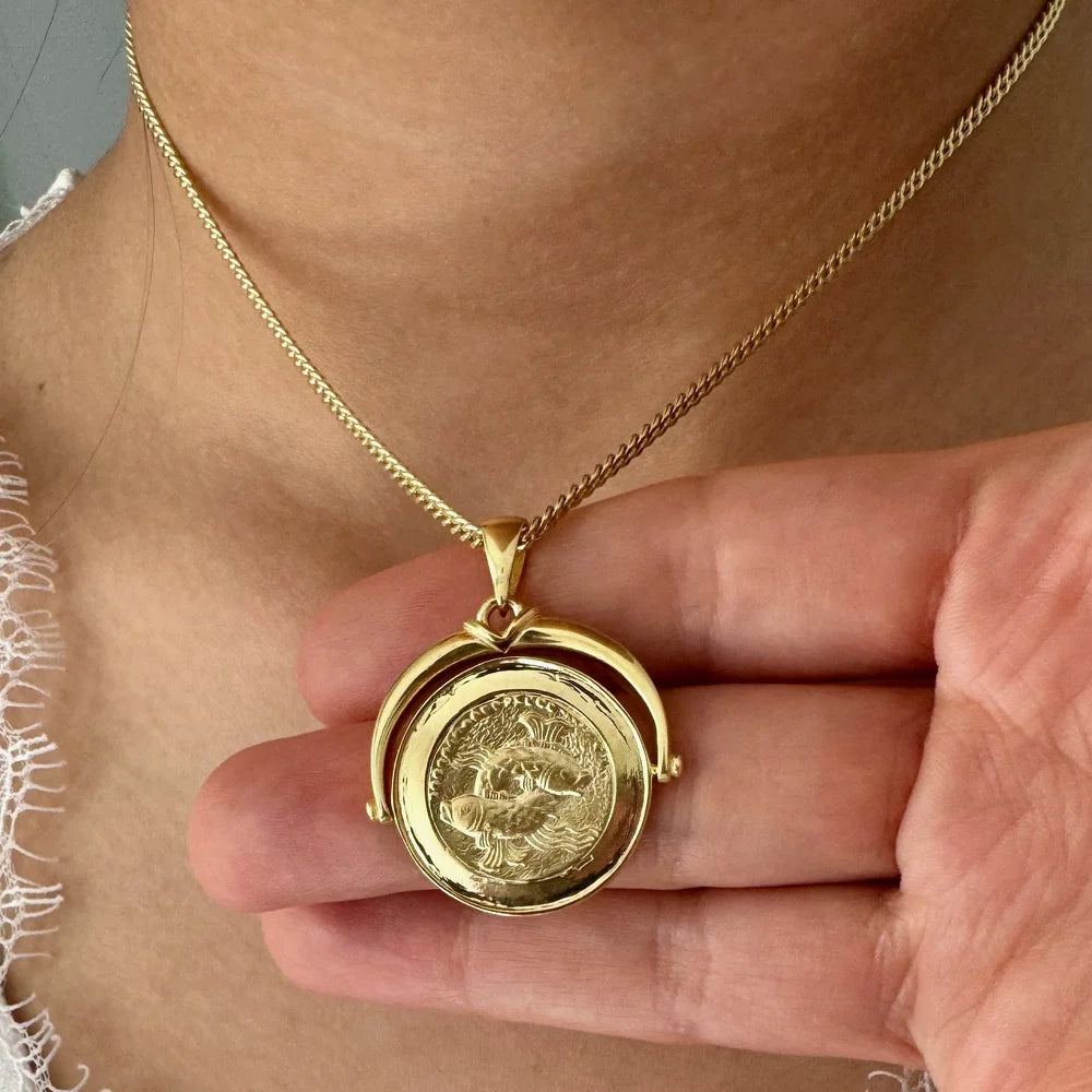 Gold coin pendant necklace featuring a vintage design, perfect for women seeking a classic, elegant accessory.