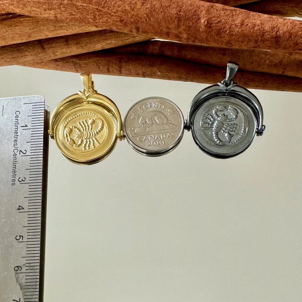 Gold and silver vintage locket pendant featuring intricate scorpion and zodiac designs, perfect for women and unisex wear.