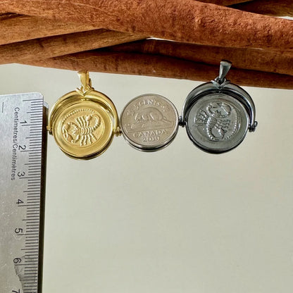 Gold and silver vintage locket pendant featuring intricate scorpion and zodiac designs, perfect for women and unisex wear.