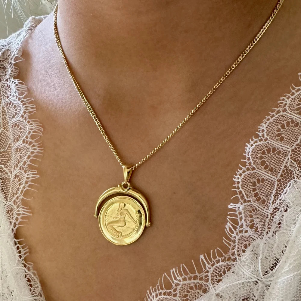 Elegant gold pendant necklace featuring a vintage coin design, perfect for women who love classic bohemian style.
