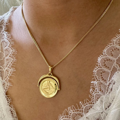 Elegant gold pendant necklace featuring a vintage coin design, perfect for women who love classic bohemian style.