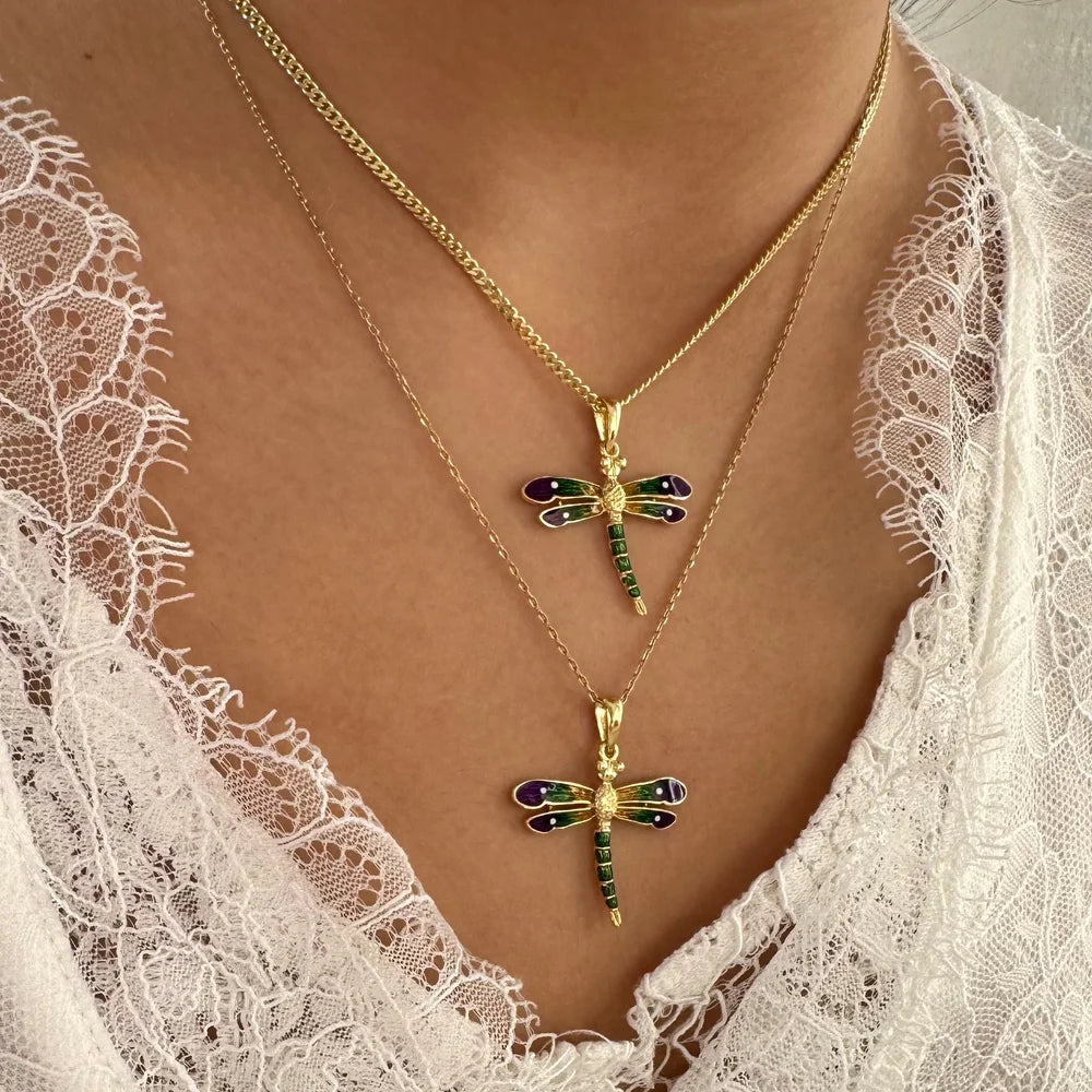 Gold dragonfly pendant necklaces adorned with colorful enamel, perfect for women seeking a unique, whimsical style.