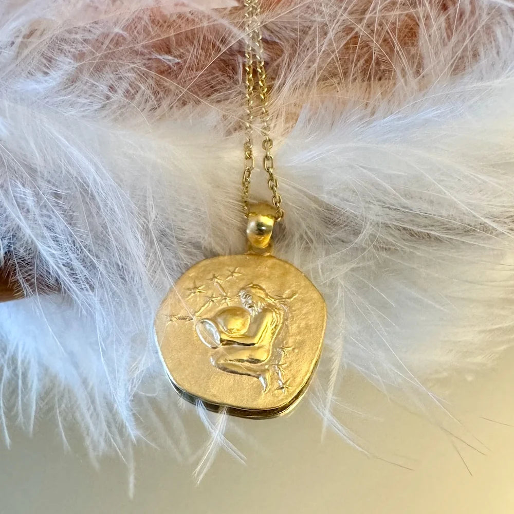 Delicate gold pendant necklace featuring a celestial design, perfect for women seeking a minimalist, stylish accessory.