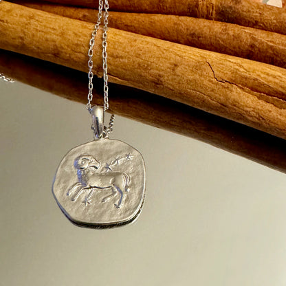 Sterling silver pendant necklace featuring a ram design, perfect for women seeking a bohemian touch to their style.