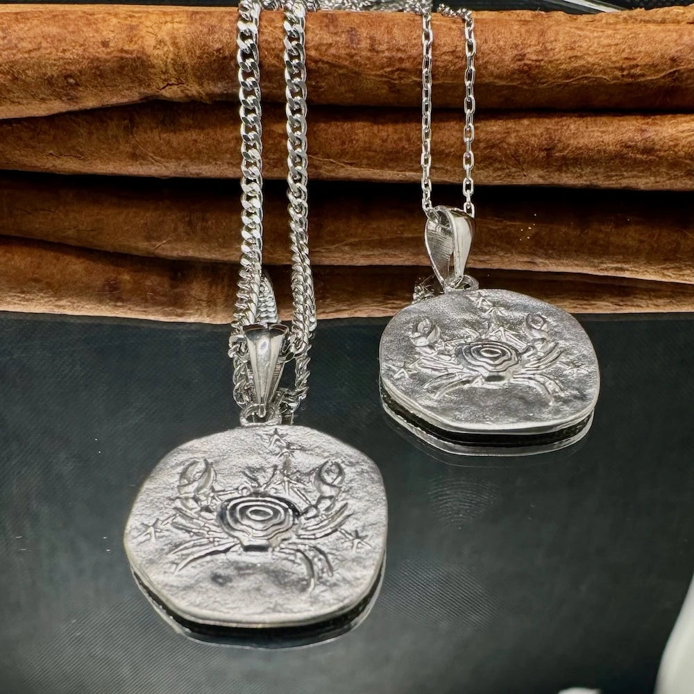 Sterling silver crab pendant necklace, perfect for beach lovers and casual wear, ideal for both men and women.