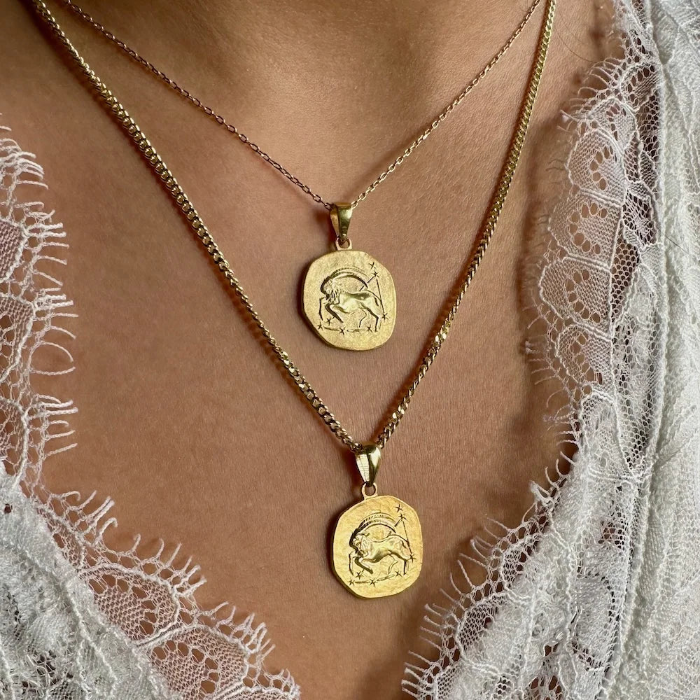 Gold layered zodiac constellation necklaces, ideal for women, feature intricate engravings for a vintage look.