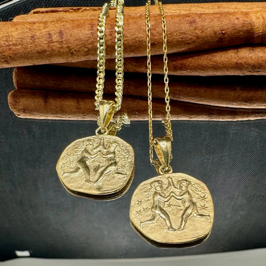 Gold Gemini charm necklaces, perfect for women celebrating their zodiac sign in a stylish and unique way.