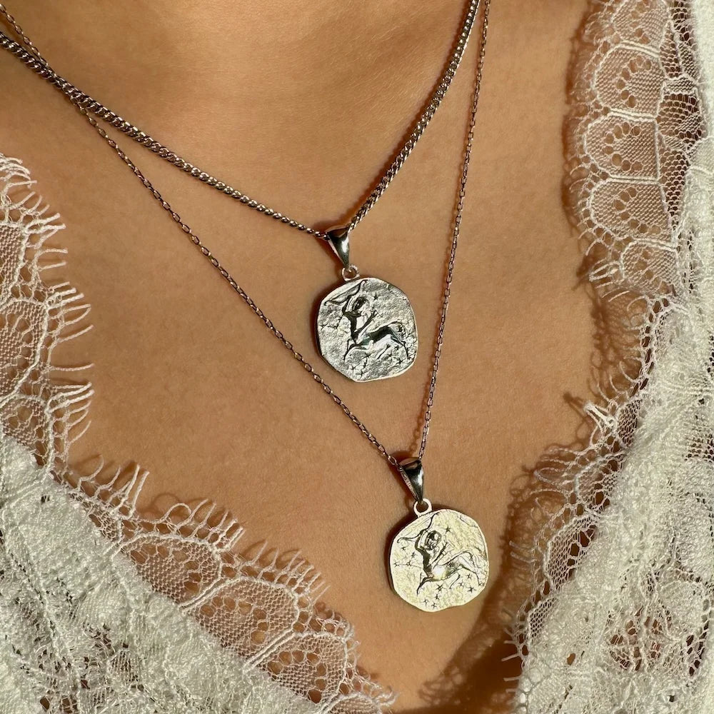 Silver layered necklaces with unique engraved pendants, perfect for women who love vintage bohemian jewelry.