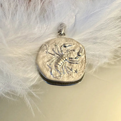 Sterling silver Scorpio zodiac pendant, perfect for women who love unique bohemian jewelry. Ideal for special occasions.
