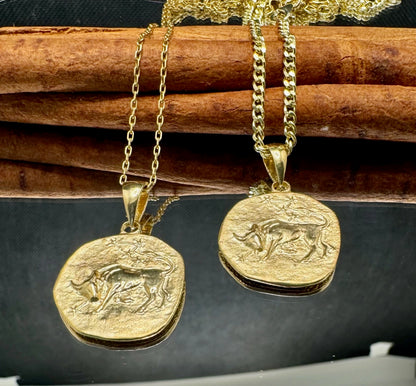 Gold zodiac bull pendant necklaces for women, featuring intricate designs, ideal for astrology lovers and gift occasions.
