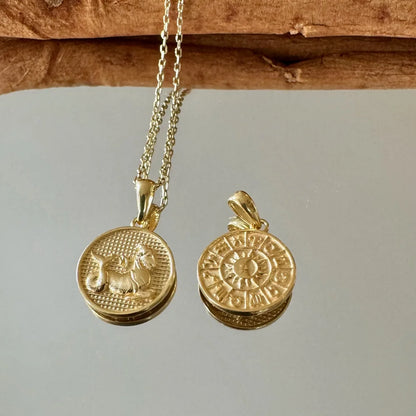 Gold vintage-inspired pendants featuring intricate designs, perfect for women seeking unique jewelry pieces.