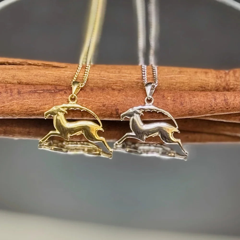 Elegant gold and silver running deer pendants for women, perfect for minimalist or bohemian jewelry lovers.